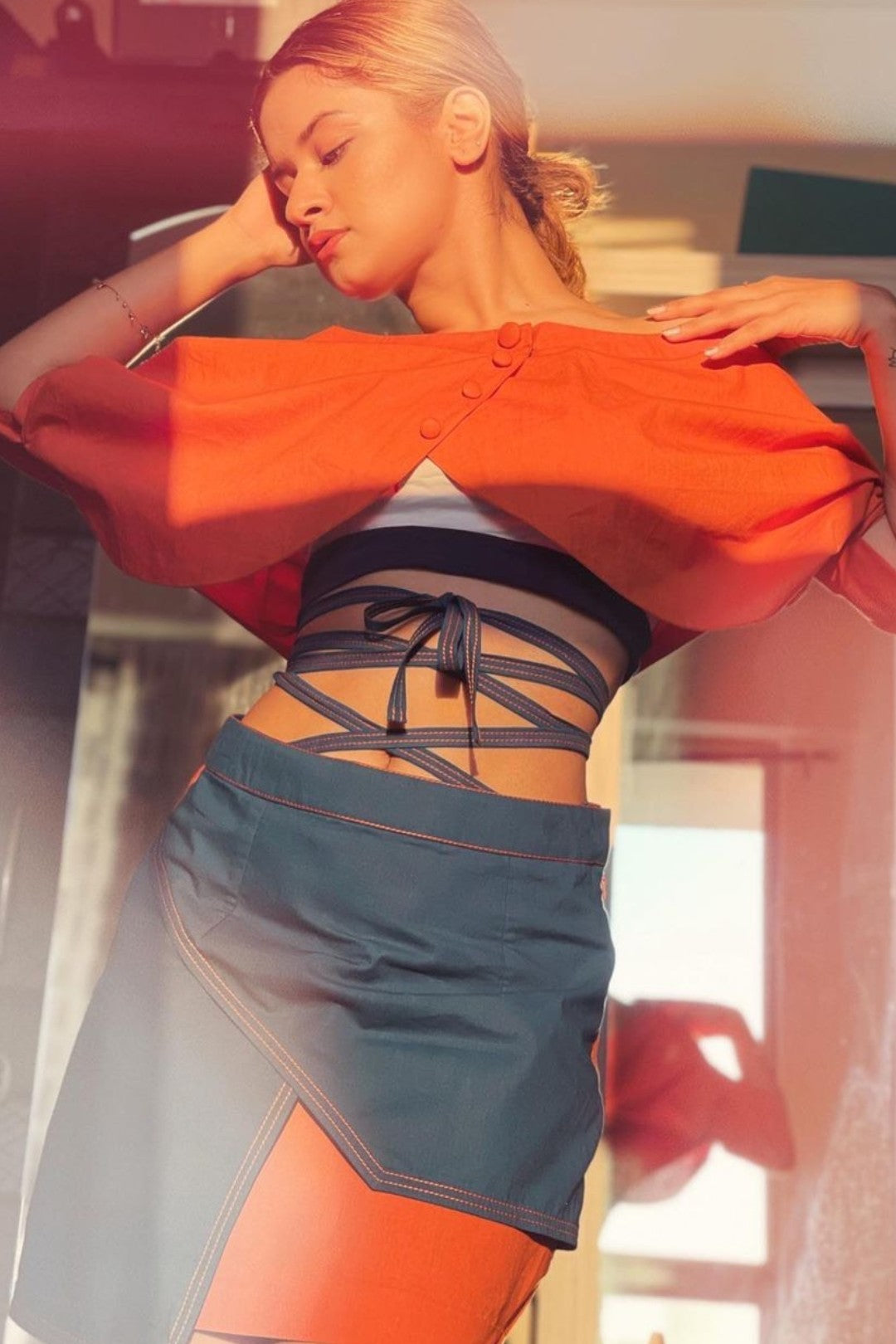 Burnt orange shrug blouse with short flap skirt