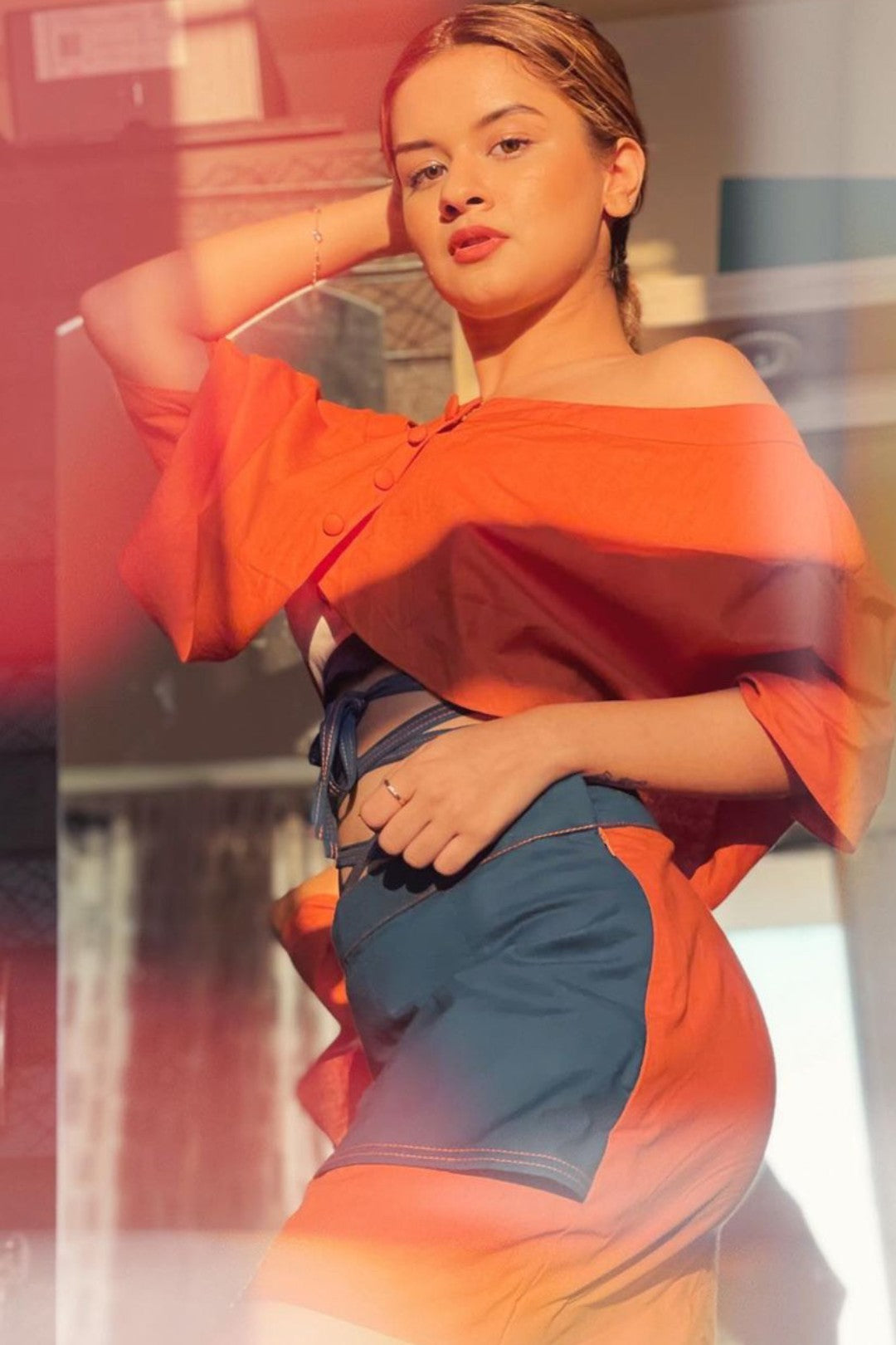 Burnt orange shrug blouse with short flap skirt