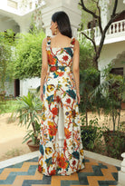 RUFFLED PRINTED TOP WITH FLARED HIGH WAIST PANTS