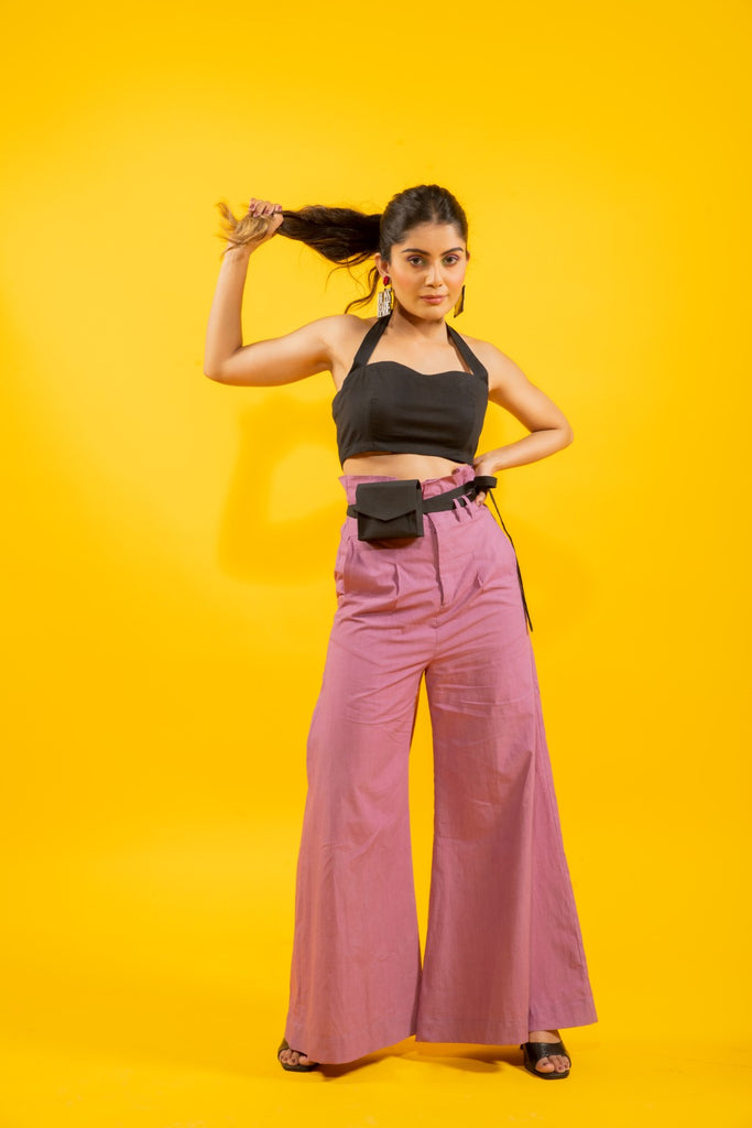 Statement black halter top with high waisted mauve flared pants
