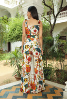 RUFFLED PRINTED TOP WITH FLARED HIGH WAIST PANTS