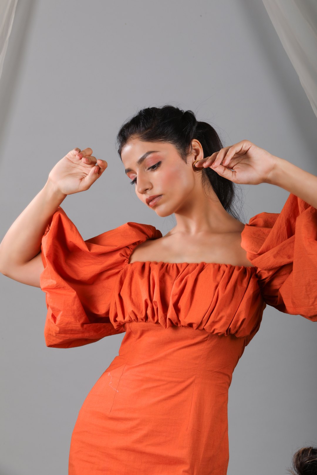 Burnt orange puff front shift dress with side slit