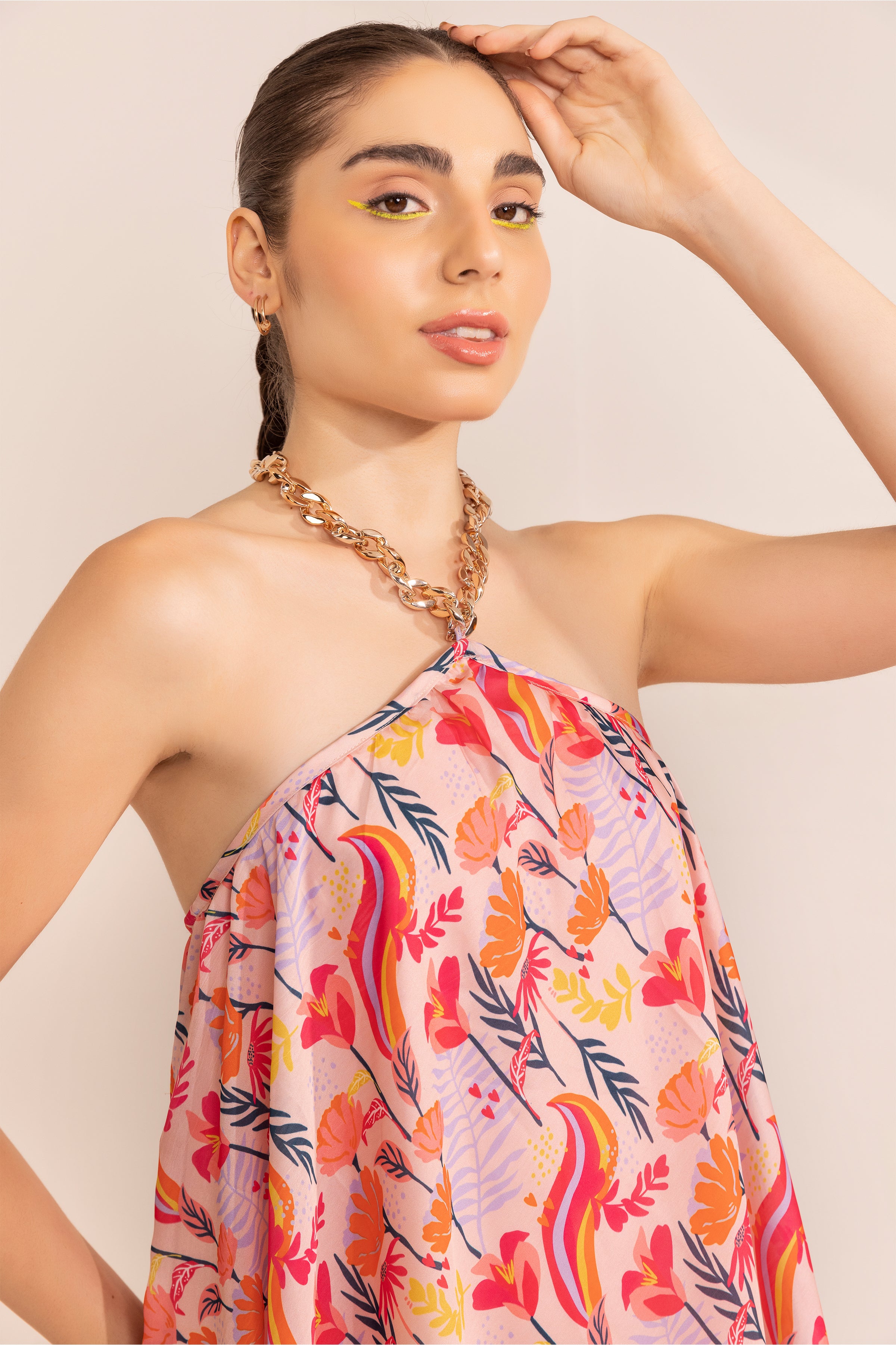 Blushing pink halter neck short dress