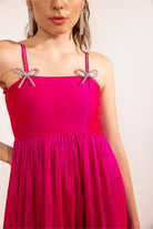 Fuschia Pink with rhinestone bow flared maxi dress