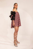 Black & red geometric print off shoulder mini dress