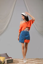Burnt orange shrug blouse with short flap skirt