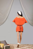 Burnt orange shrug blouse with short flap skirt