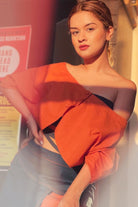 Burnt orange shrug blouse with short flap skirt